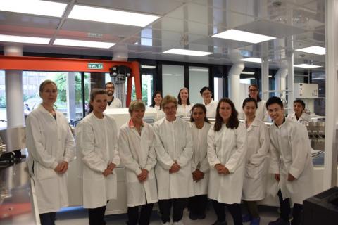 Photo of Minister Kirsty Duncan with members of PCIGR inside the nUBC lab